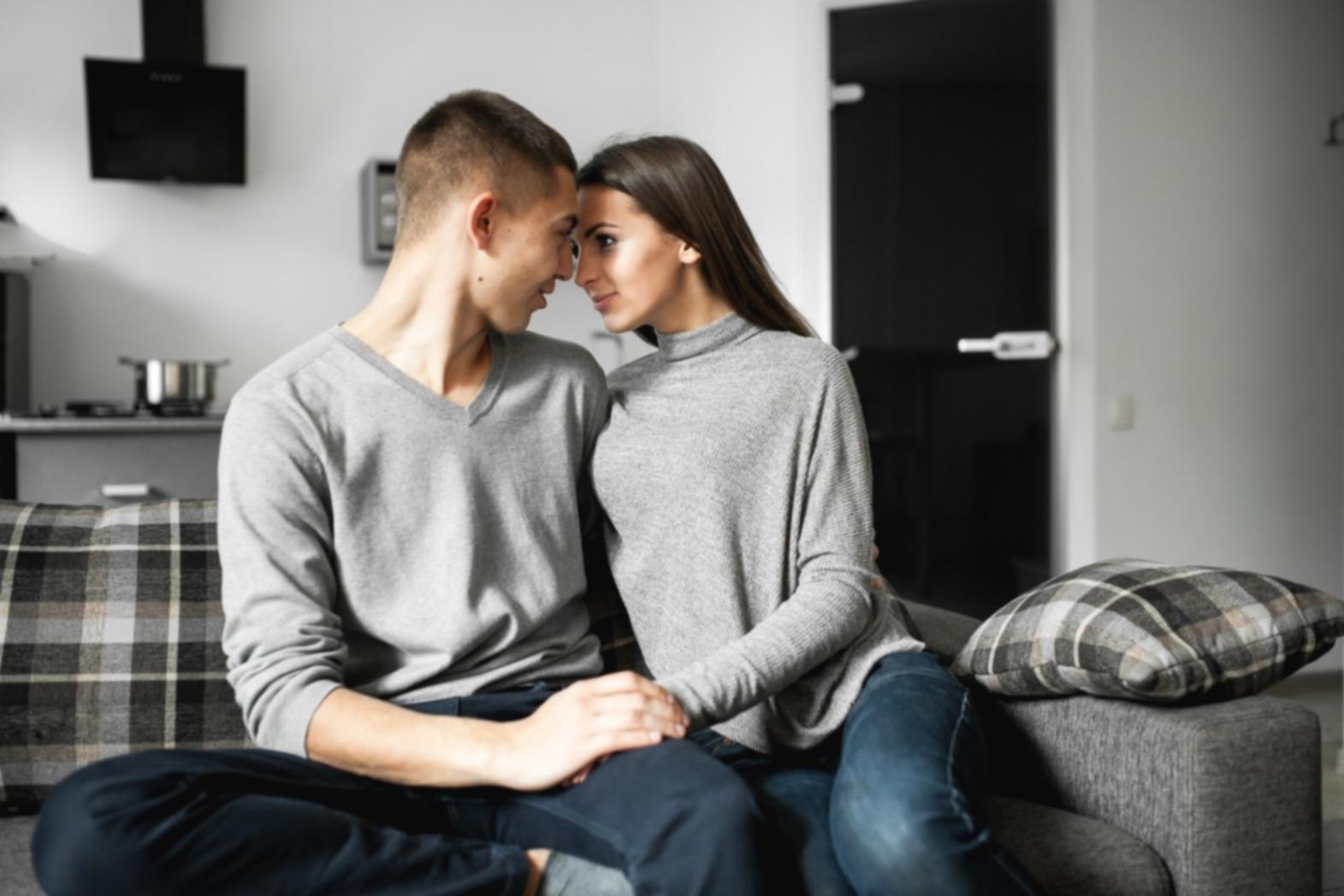 Family gathered around kitchen table sharing stories and creating memories together