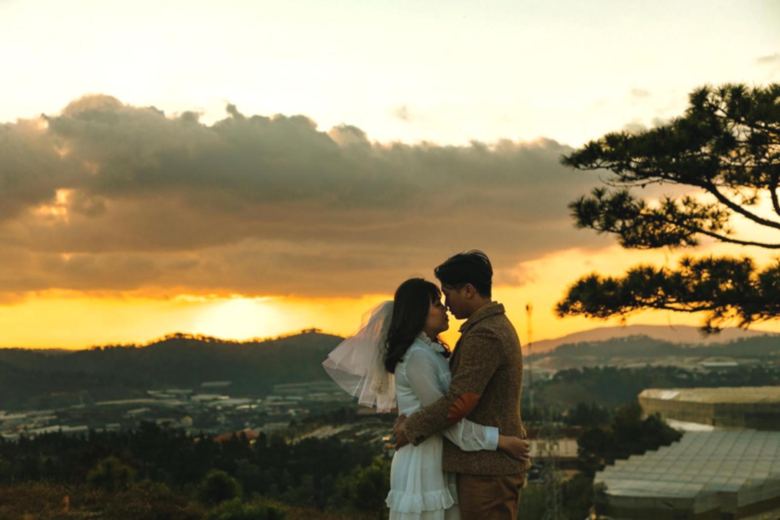 Family gathered around dinner table sharing a meal together
